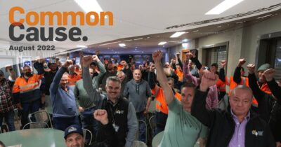 MEU Members with fists raised