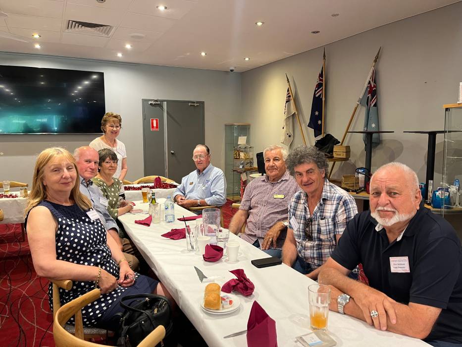 Retired miners having dinner