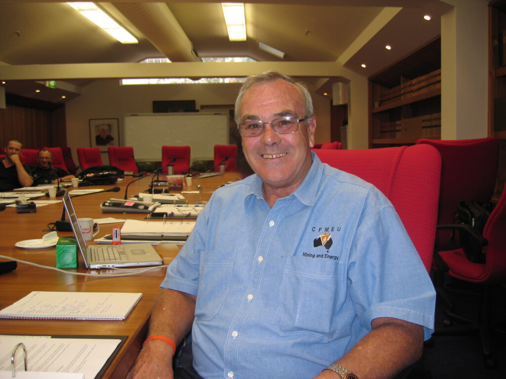 Allen Drew, former President of the NSW Energy District wearing a blue shirt with a Mining and Energy logo