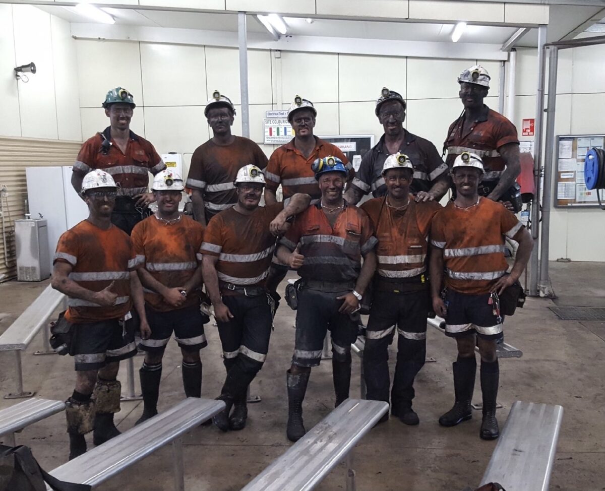 10 coal minders standing in PPE