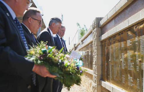 Anthony Albanese views the names on the Jim Comerford Memorial Wall